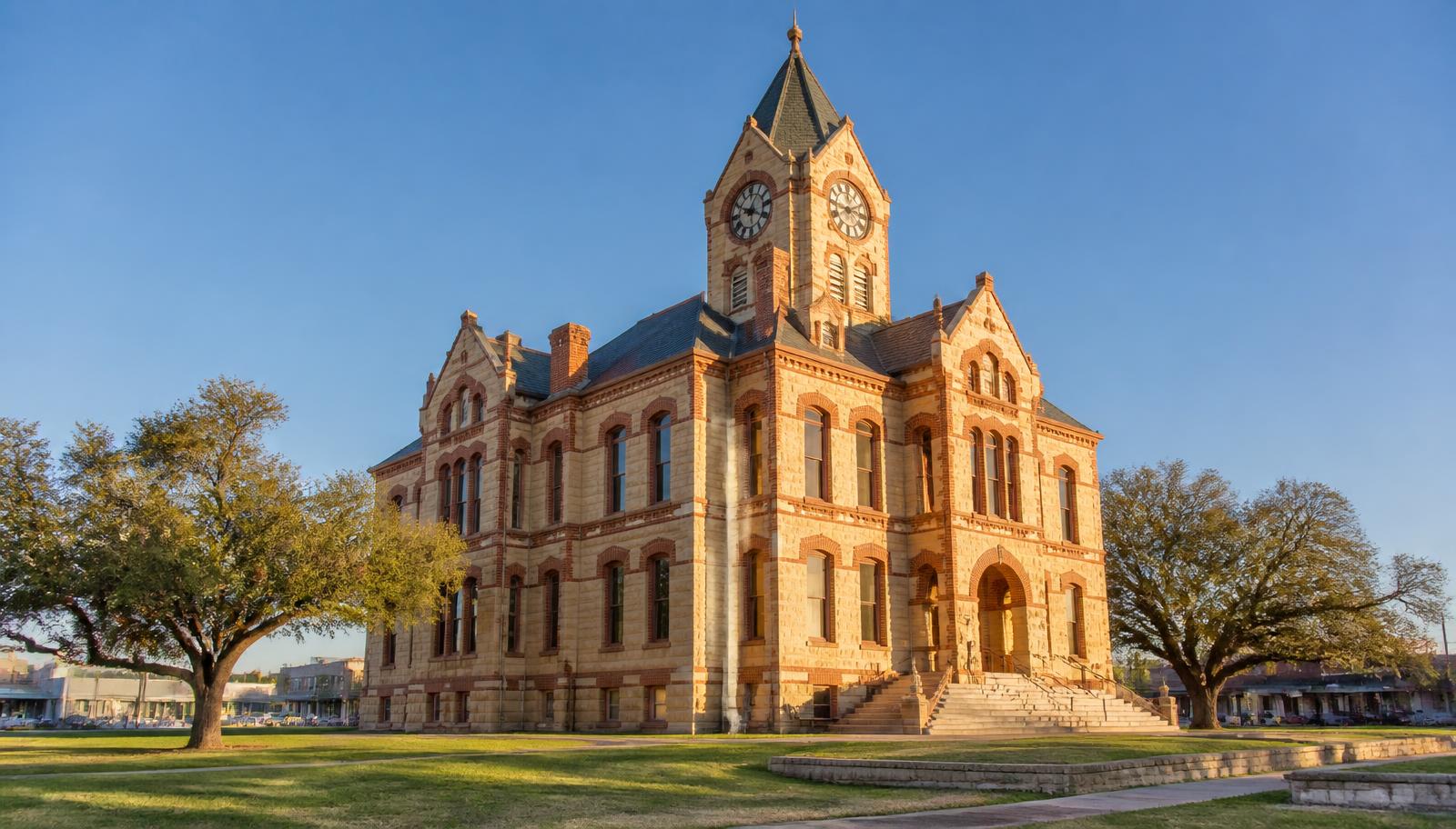 The historic Frio County Courthouse in Pearsall, Texas at sunset